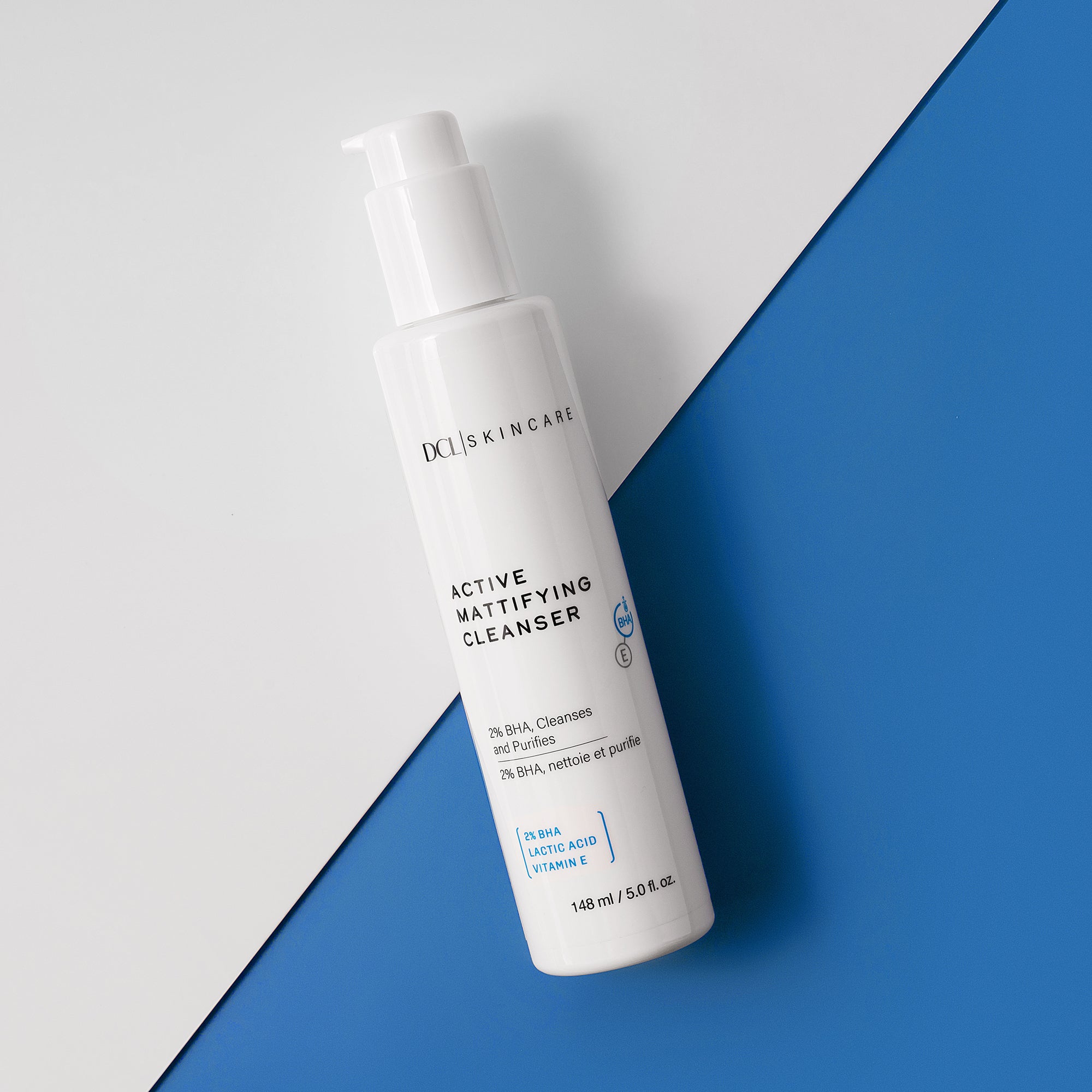 Active Mattifying Cleanser flat lay against white and blue background