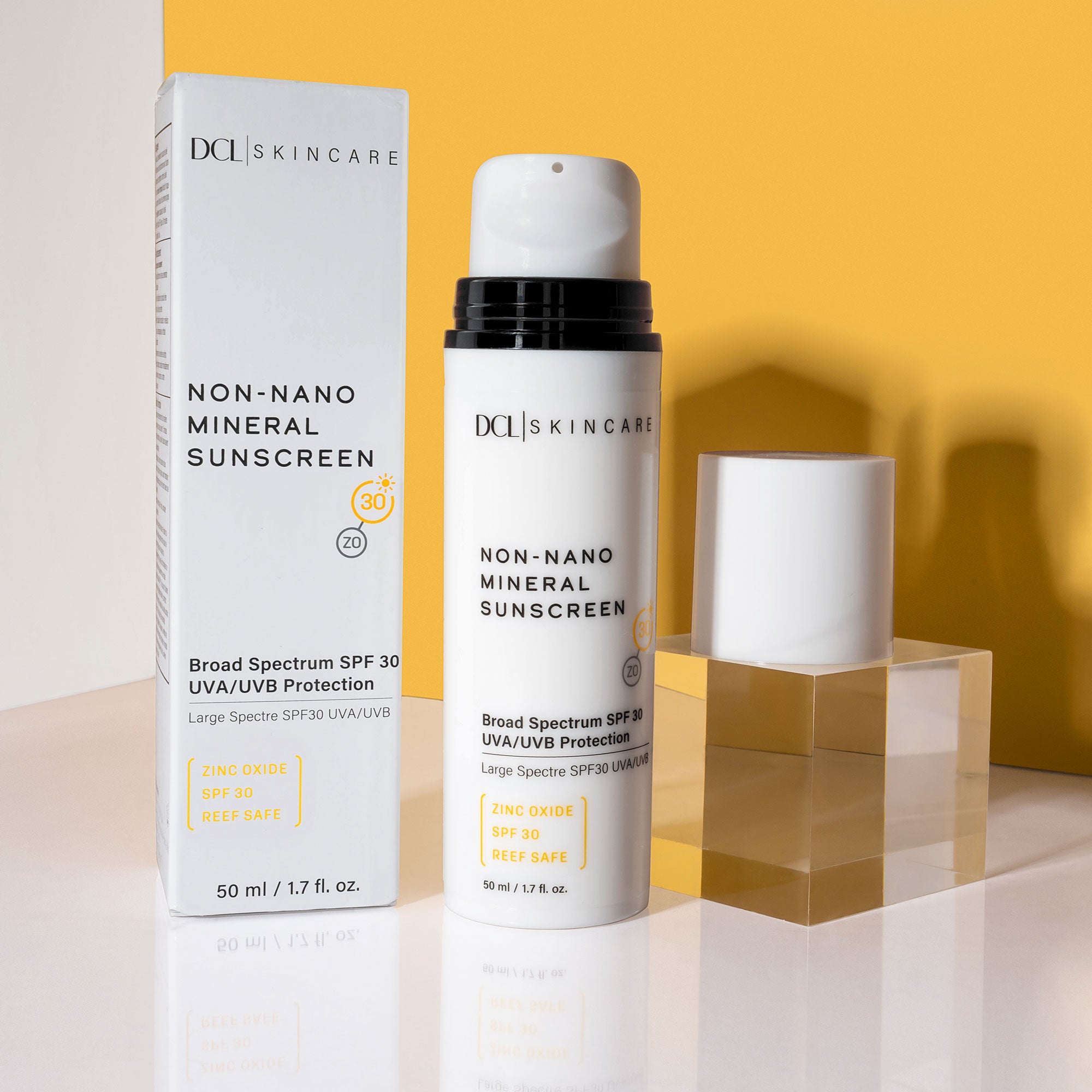 Non-Nano Mineral Sunscreen Carton and Bottle against yellow background